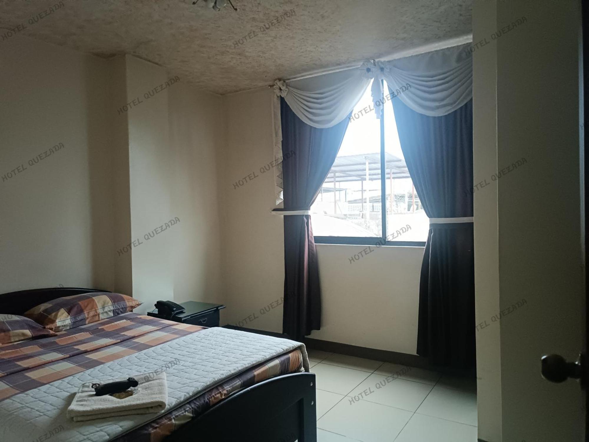 Hotel Quezada Hermanos Санто Доминго де лос Колорадос Екстериор снимка